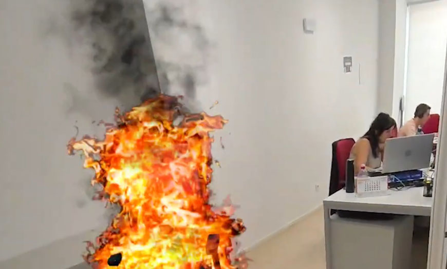 Simulación inmersiva de incendio en una oficina Simulación de un incendio en una oficina mediante una experiencia inmersiva aplicada al entorno real.